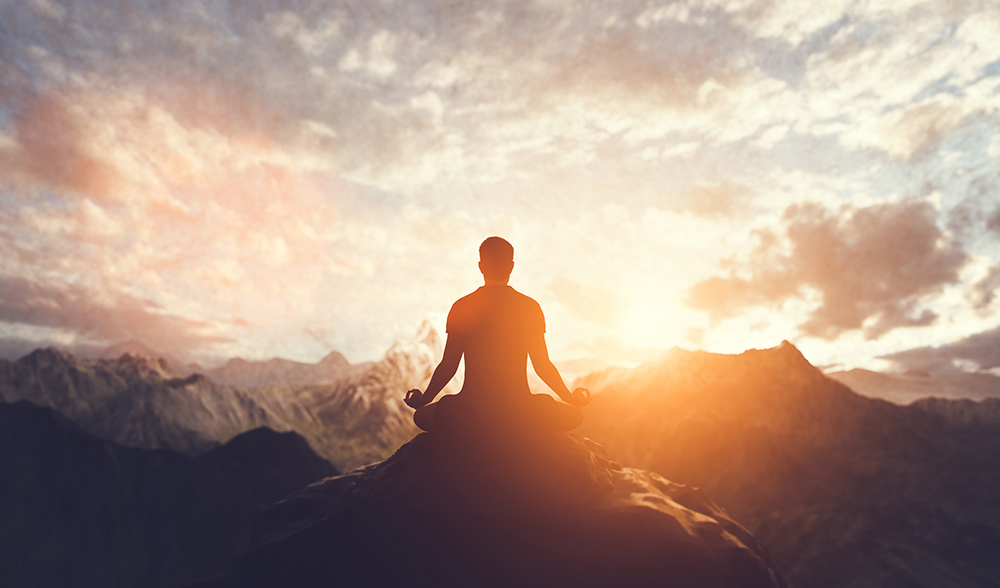 yoga pose on mountain